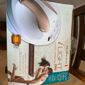 Remington iLight Pro. Box opened but never used. Still in plastic.